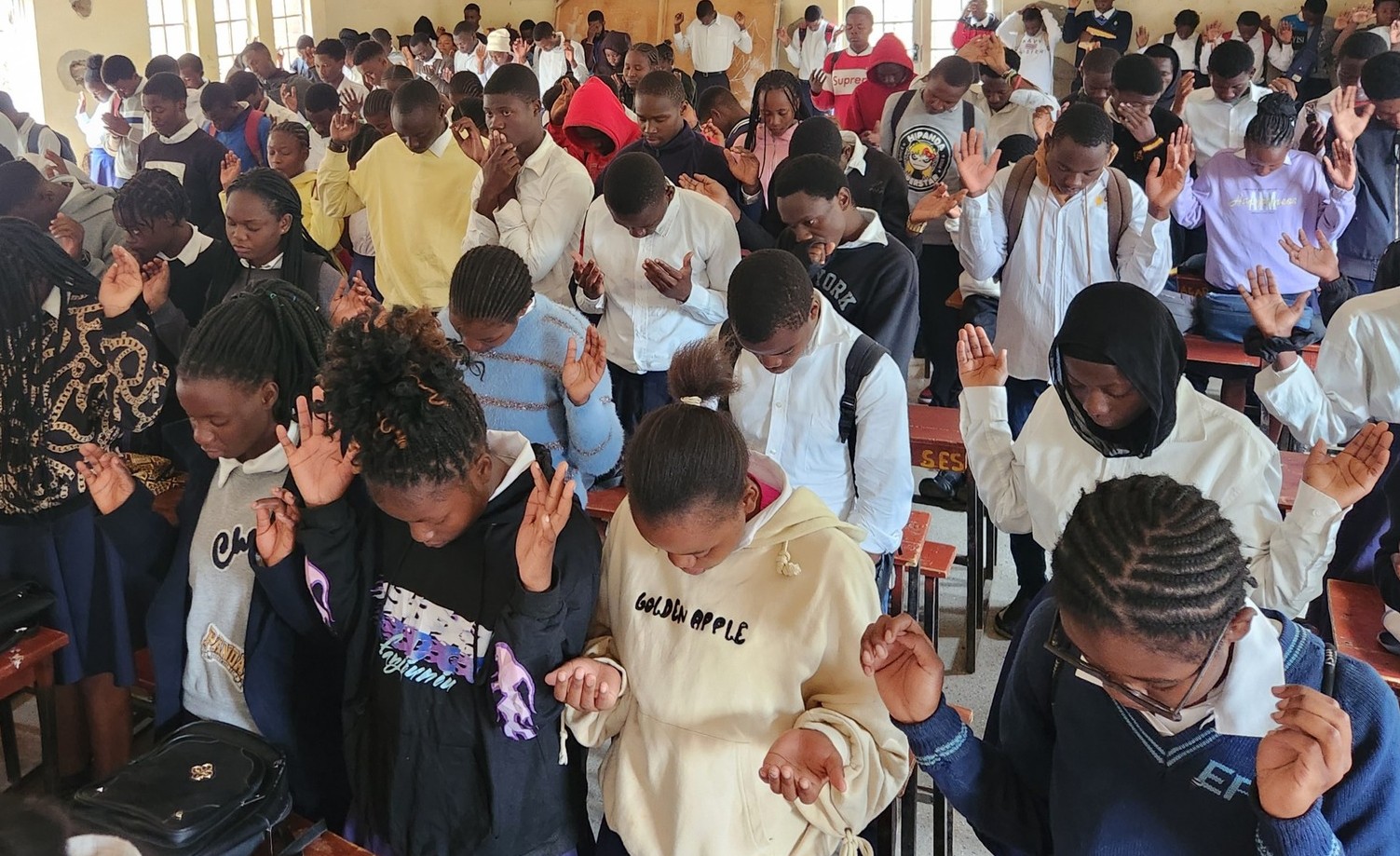 students praying